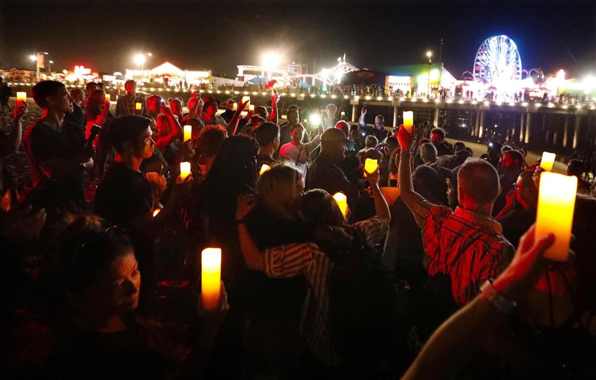 A vigil for the Conception boat fire victims held near the Santa Monica Pier
