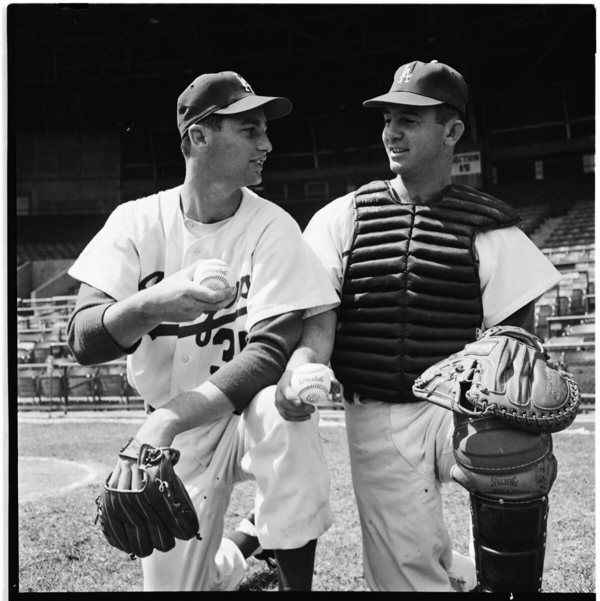 Norm Sherry, right, and his brother Larry in 1958.