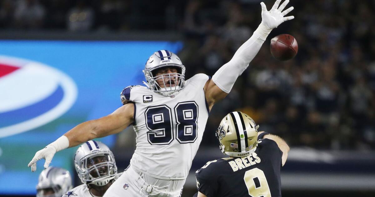 Cowboys stifle Brees, end Saints' 10-game win streak, 13-10 – The Denver  Post