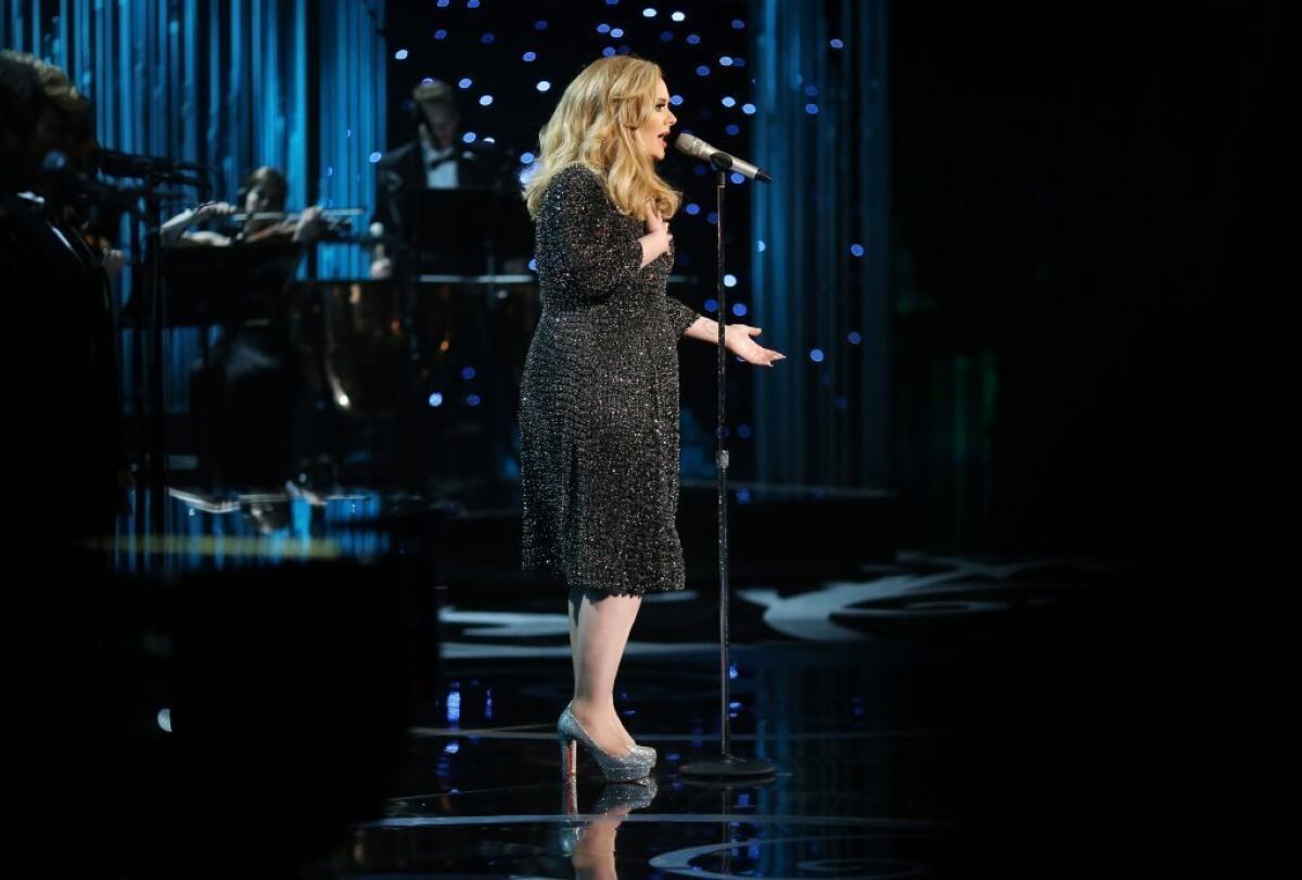 Adele sings "Skyfall" at the Academy Awards.