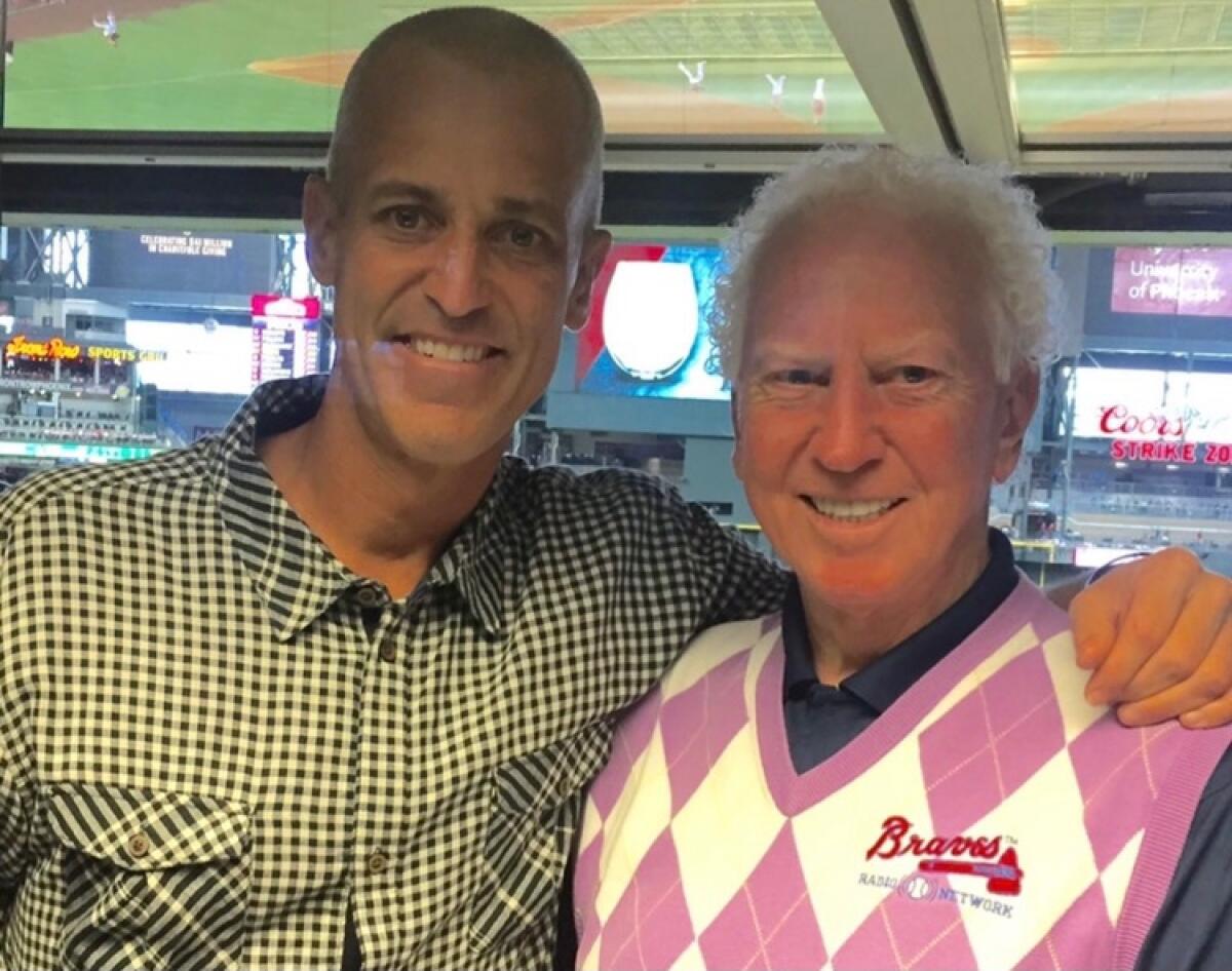 Daron Sutton, shown with his Hall of Fame father Don, will not be part of the Angels broadcast team the rest of this season.