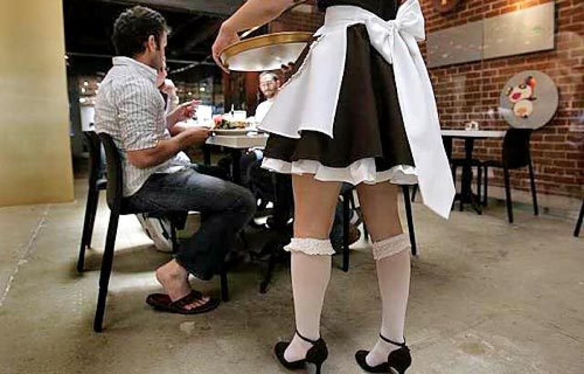 READY TO SERVE: Waitresses are dressed as French maids at Culver Citys Royal/T Cafe, part of the Asian-influenced trend of theme restaurants.