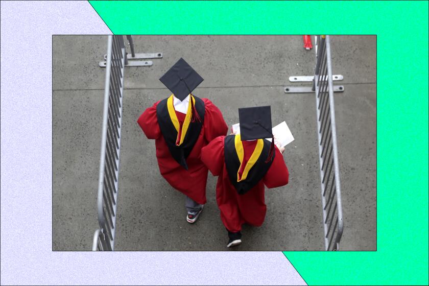 Overhead photo of two graduates walking