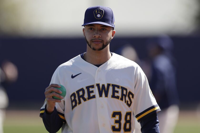 Milwaukee Brewers relief pitcher Devin Williams during spring training baseball Thursday, Feb. 13, 2020, in Phoenix. (AP Photo/Gregory Bull)