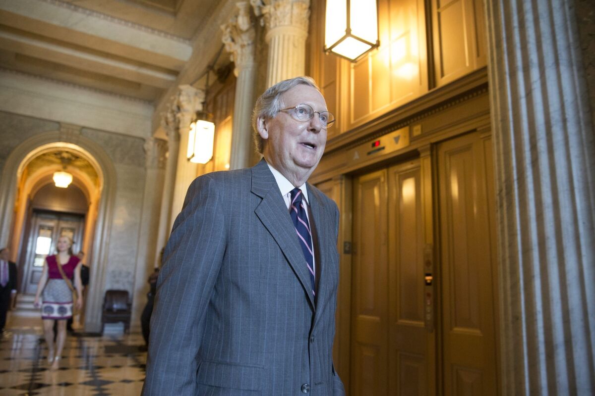 US Senate Majority Leader, Republican Mitch McConnell, walks to a meeting of Republican Senators near the Senate chamber, on Capitol Hill in Washington DC/