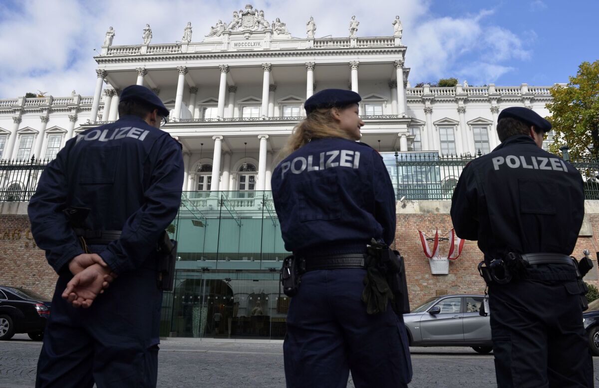 Police in Vienna stand outside the Palais Coburg palace where talks were taking place between six major powers and Iran on Oct. 16. The seven nations are seeking a deal ahead of a Nov. 24 deadline.
