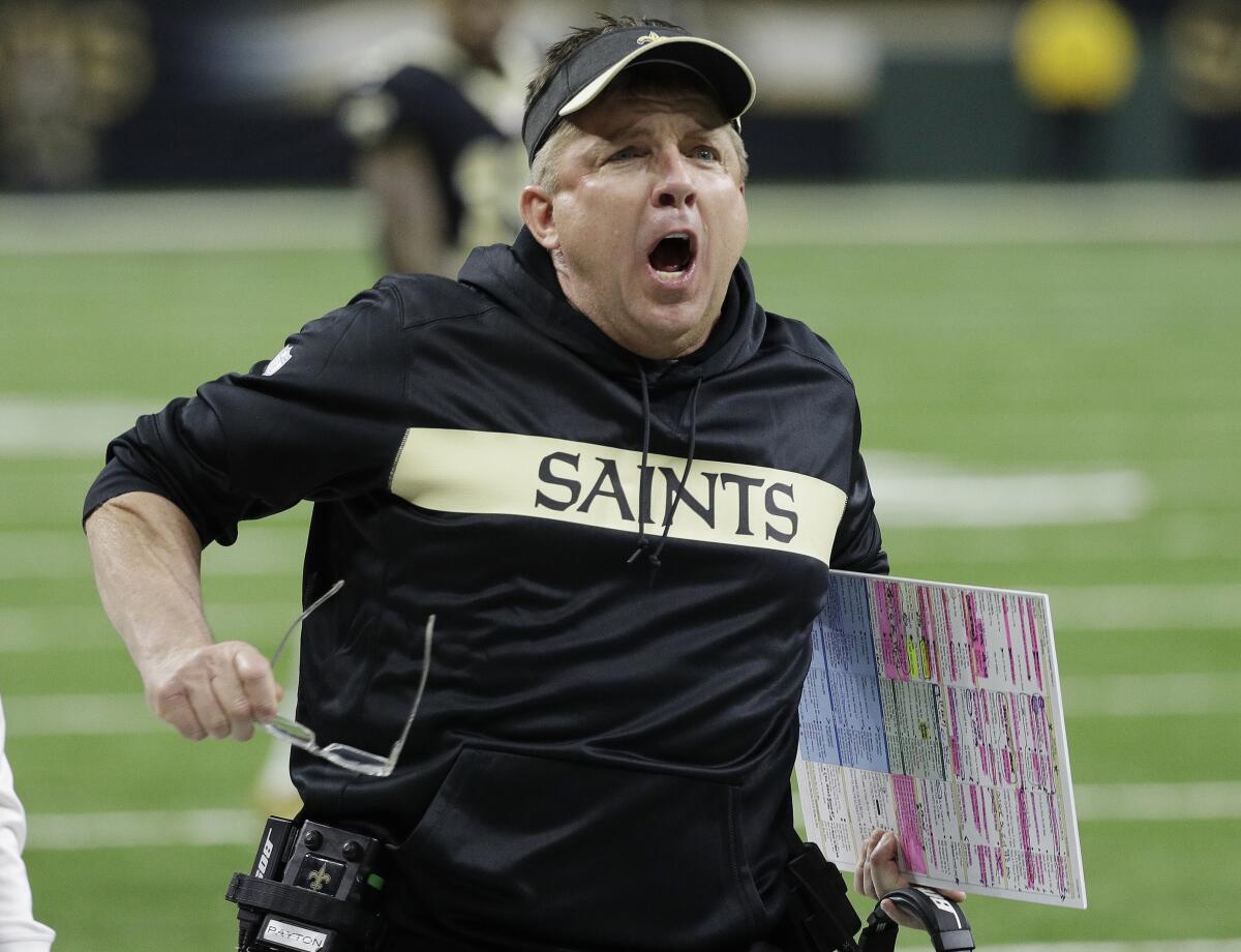 Saints coach Sean Payton reacts to a call during the second half of last season's NFC championship game loss to the Rams.