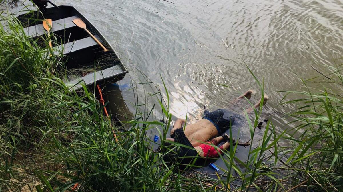 View of the bodies of Salvadoran migrant Oscar Martinez Ramirez and his daughter, who drowned while trying to cross the Rio Grande on June 24.