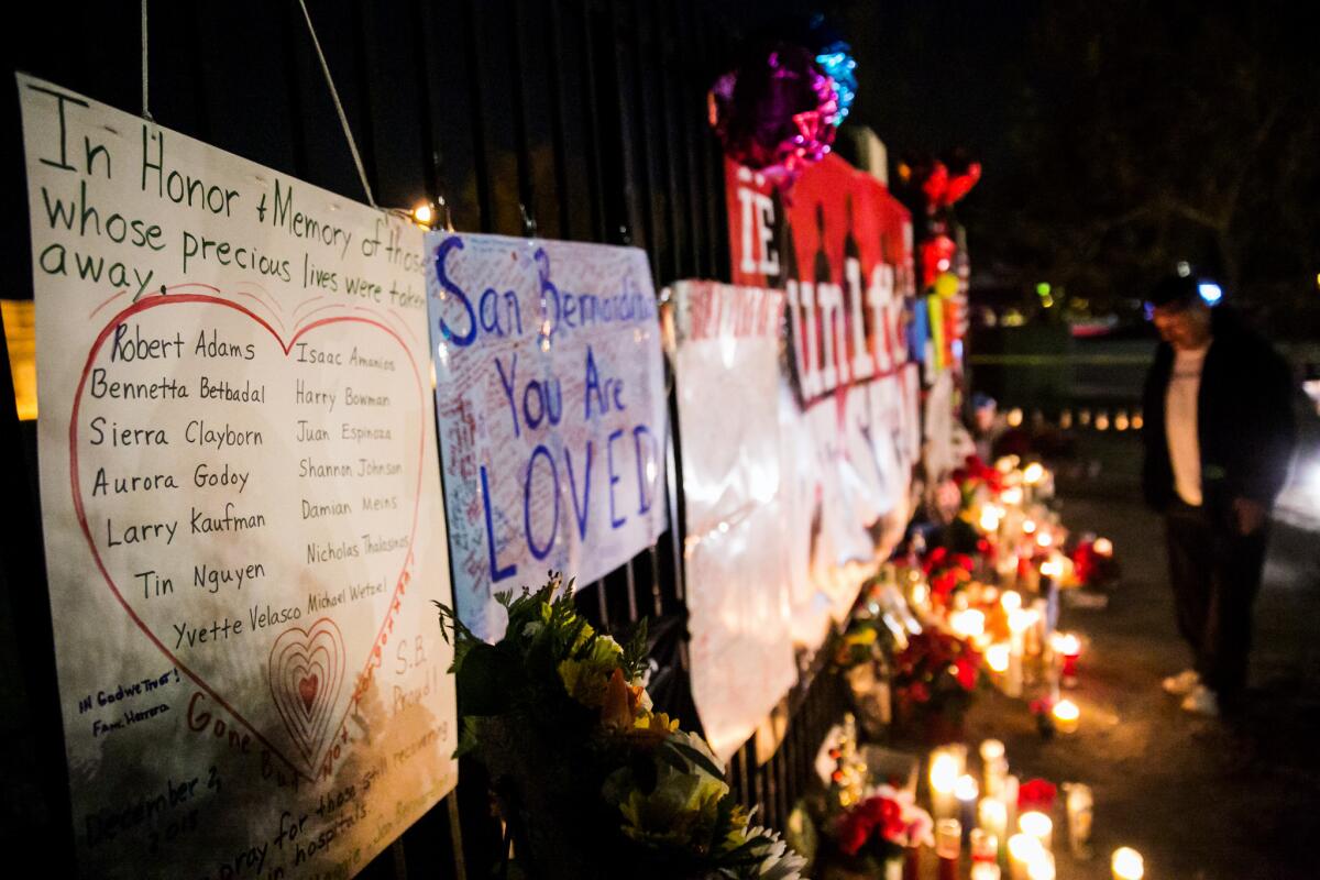 The names of all the victims of the San Bernardino shooting rampage are listed at a memorial site near the Inland Regional Center, in San Bernardino, Calif., on Dec. 6, 2015.