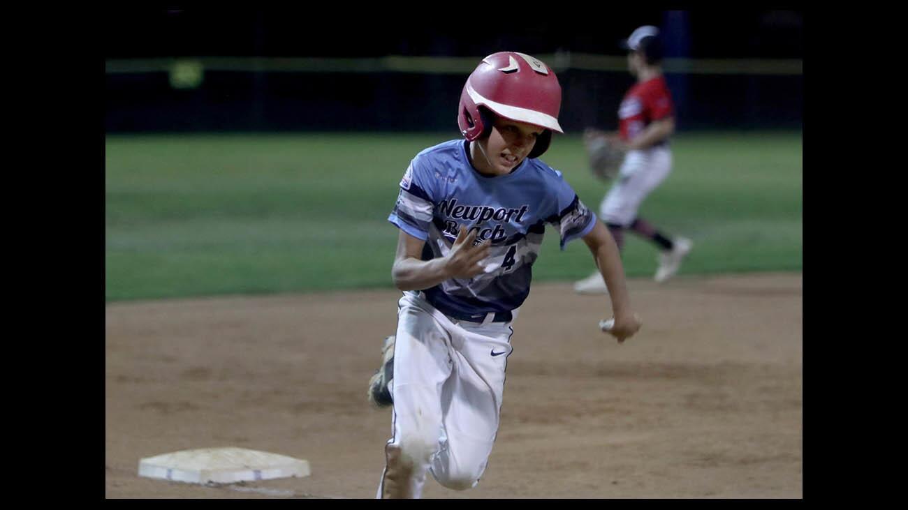 Newport Beach Pony Bronco 11U #4 Brady Annett races home to score a run on an errant throw to third base vs. Escondito in Super Region tournament at York Field in Whittier, on Thursday, July 12, 2018.