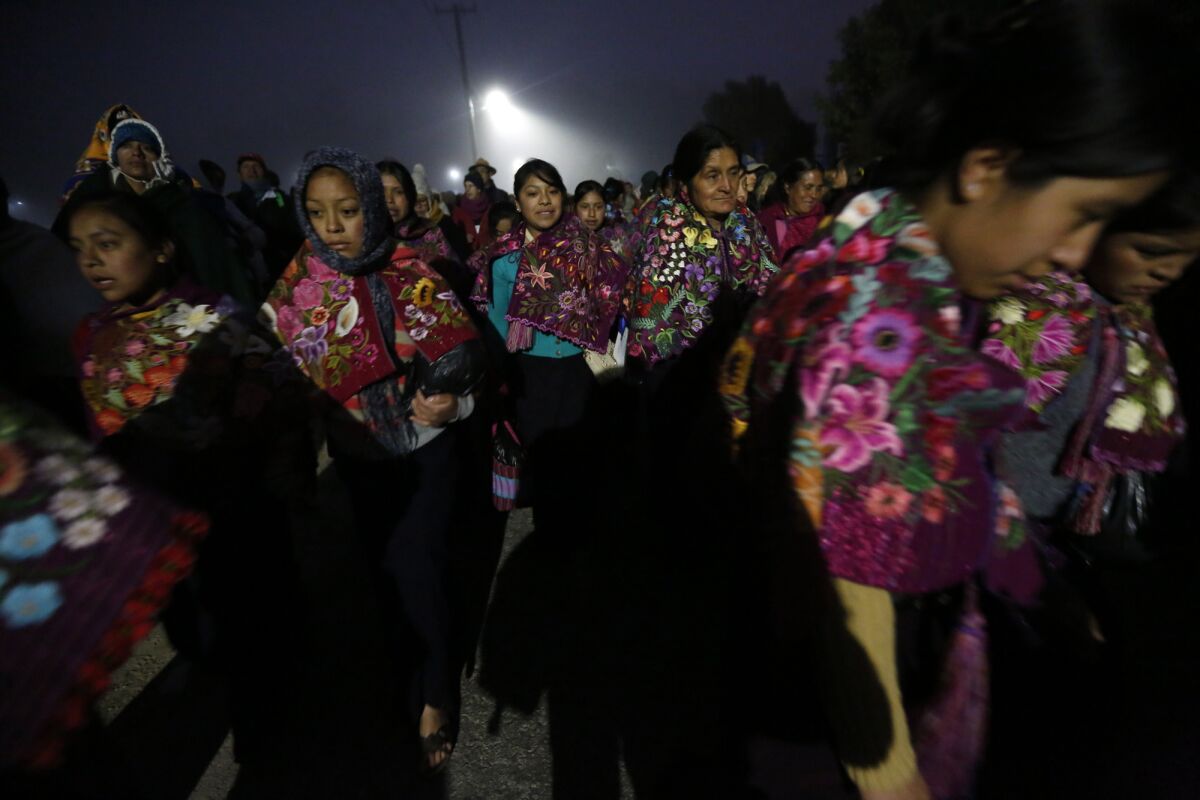 Indigenous pilgrims from villages surrounding the southern Mexican town of San Cristobal de las Casas walk to the Municipal Sports Center, where Pope Francis conducted Mass.