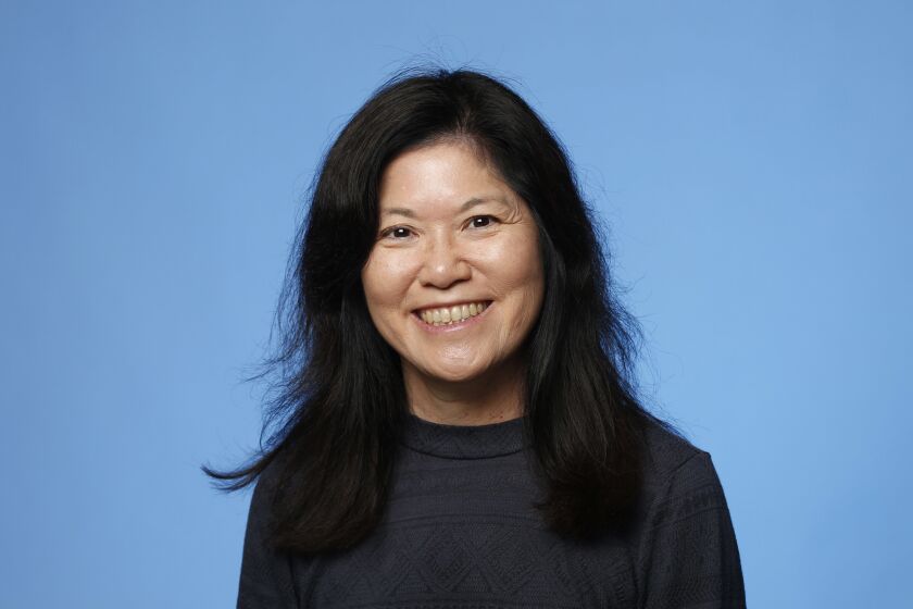 Assistant Managing Editor Loree Matsui