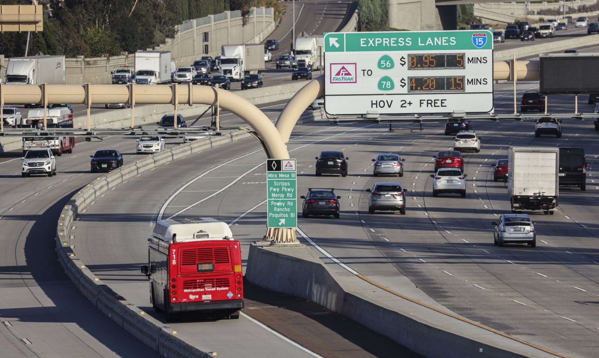 A bus rides in an express lane on Interstate 15 between Escondido and state Route 52 on Wednesday, Dec. 8, 2021.
