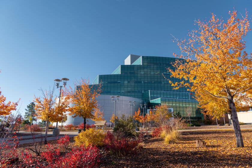 The National Security Sciences Building is seen in fall in Los Alamos, N.M.