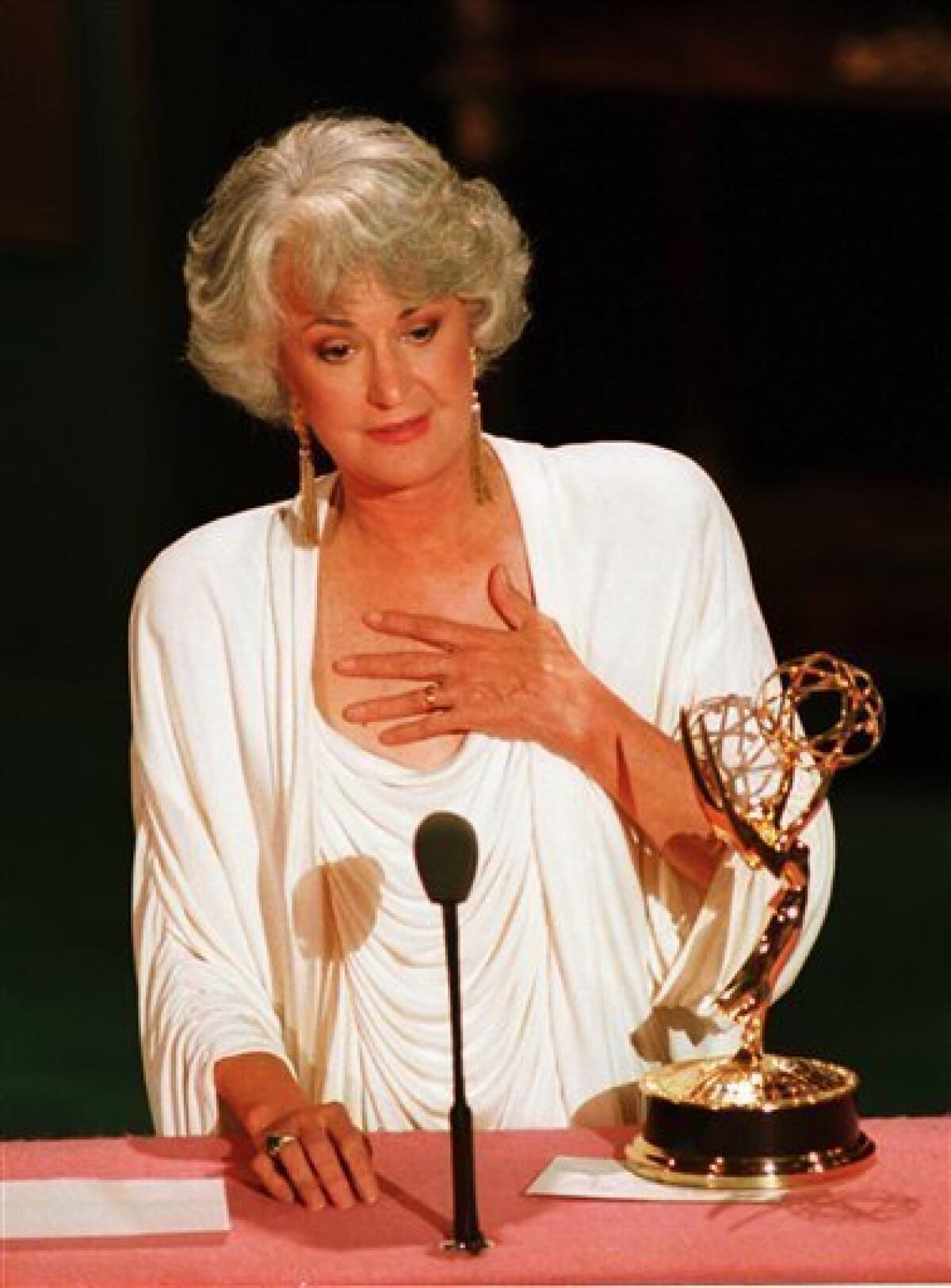 FILE - This Aug. 29, 1988 file photo shows actress Beatrice Arthur accepting her Emmy award at the 40th annual Emmy Awards ceremony in Pasadena, Ca. Family spokesman Dan Watt says the 86-year-old Arthur died at home early Saturday, April 25, 2009. He says Arthur had cancer, but declined to give further details. (AP Photo/Reed Saxon, File)