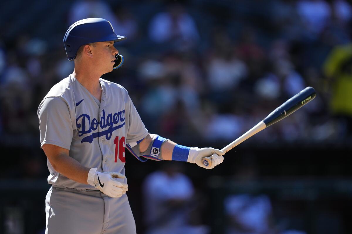 Dodgers catcher Will Smith bats against the Arizona Diamondbacks on April 9.