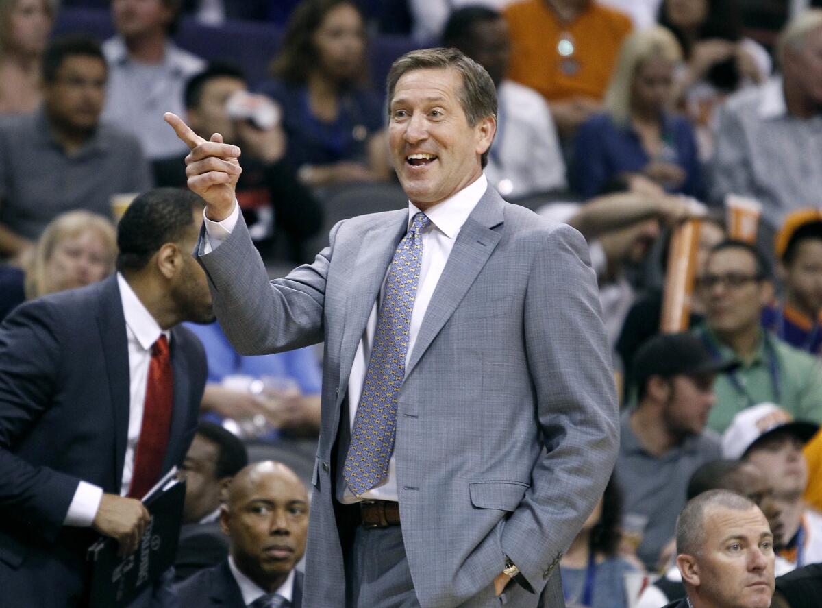 Then-Phoenix Suns Coach Jeff Hornacek smiles as he questions a foul call by an official during a game against the Knicks on Mar. 15, 2015.