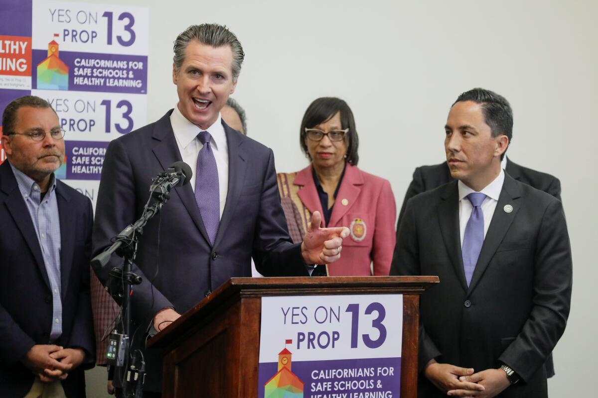Gov. Gavin Newsom promotes Proposition 13 in February. It appears that voters rejected the bond proposal.