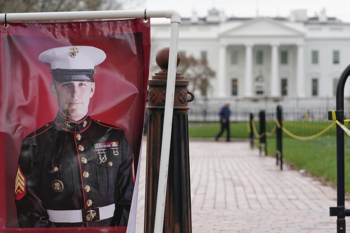 A poster of U.S. Marine Corps veteran Trevor Reed in Lafayette Park near the White House.