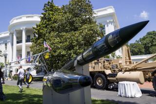 FILE - A Terminal High Altitude Area Defense (THAAD) anti-ballistic missile defense system is displayed during a Made in America showcase on the South Lawn of the White House, July 15, 2019, in Washington. (AP Photo/Alex Brandon, File)