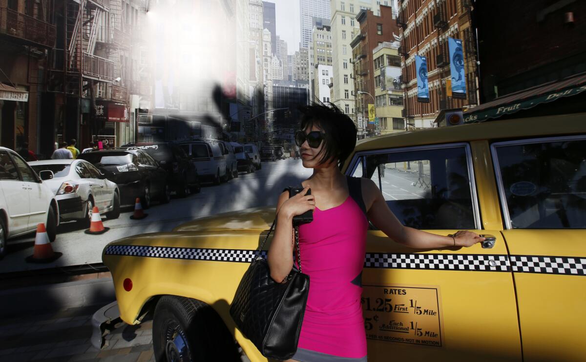 When The Times asked to spend an afternoon with celebrated pianist Yuja Wang, she surprised us with her suggestion of locales: Universal Studios Hollywood, where she posed in front of a New York backdrop.