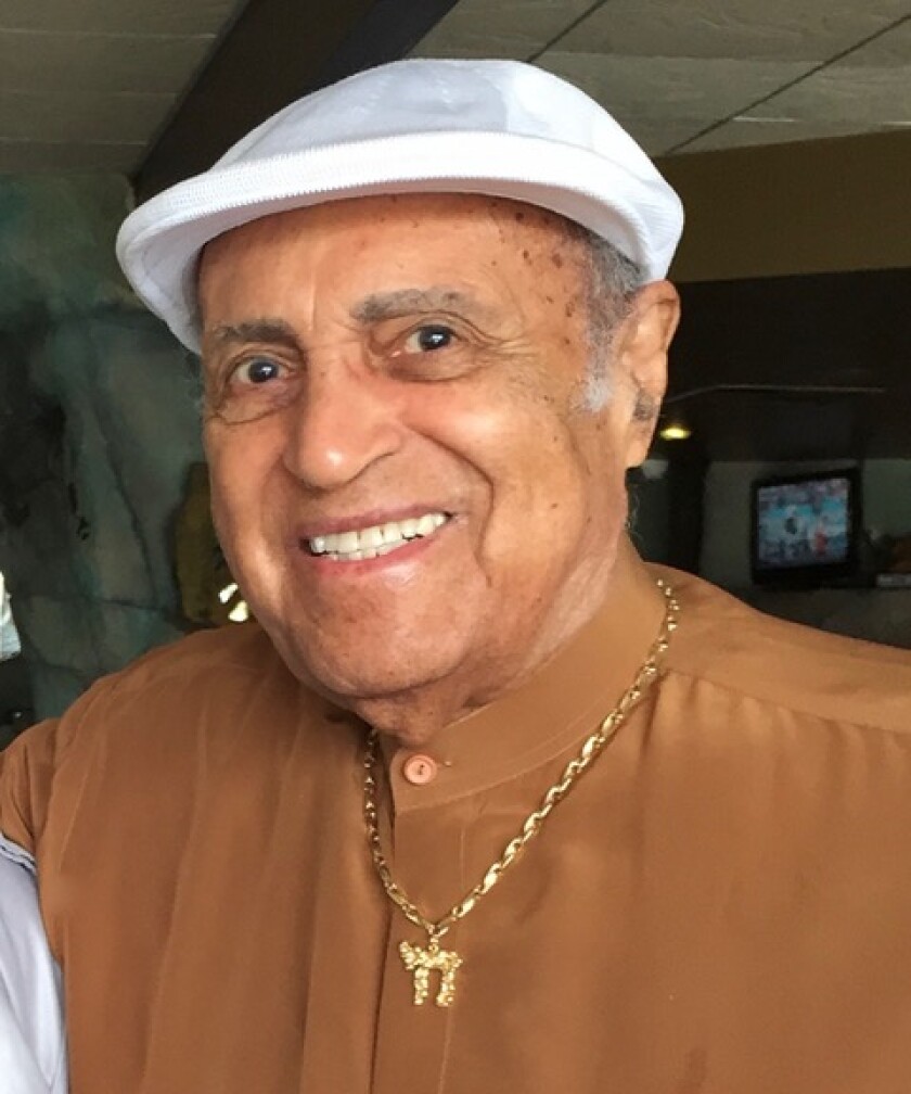 Leonard "Len" Perry, pictured in 2018, says his early experiences with racism spurred him to rise above it.