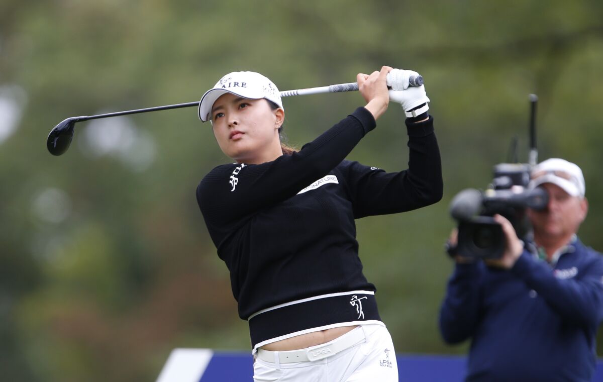 Jin Young Ko, of South Korea, hits from the sixth tee during the third round of the Cognizant Founders Cup golf tournament Saturday, Oct. 9, 2021, in West Caldwell, N.J. (AP Photo/Noah K. Murray)