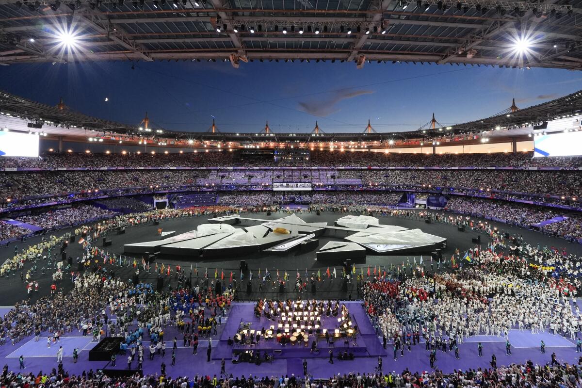 Athletes fill the infield during the 2024 Su