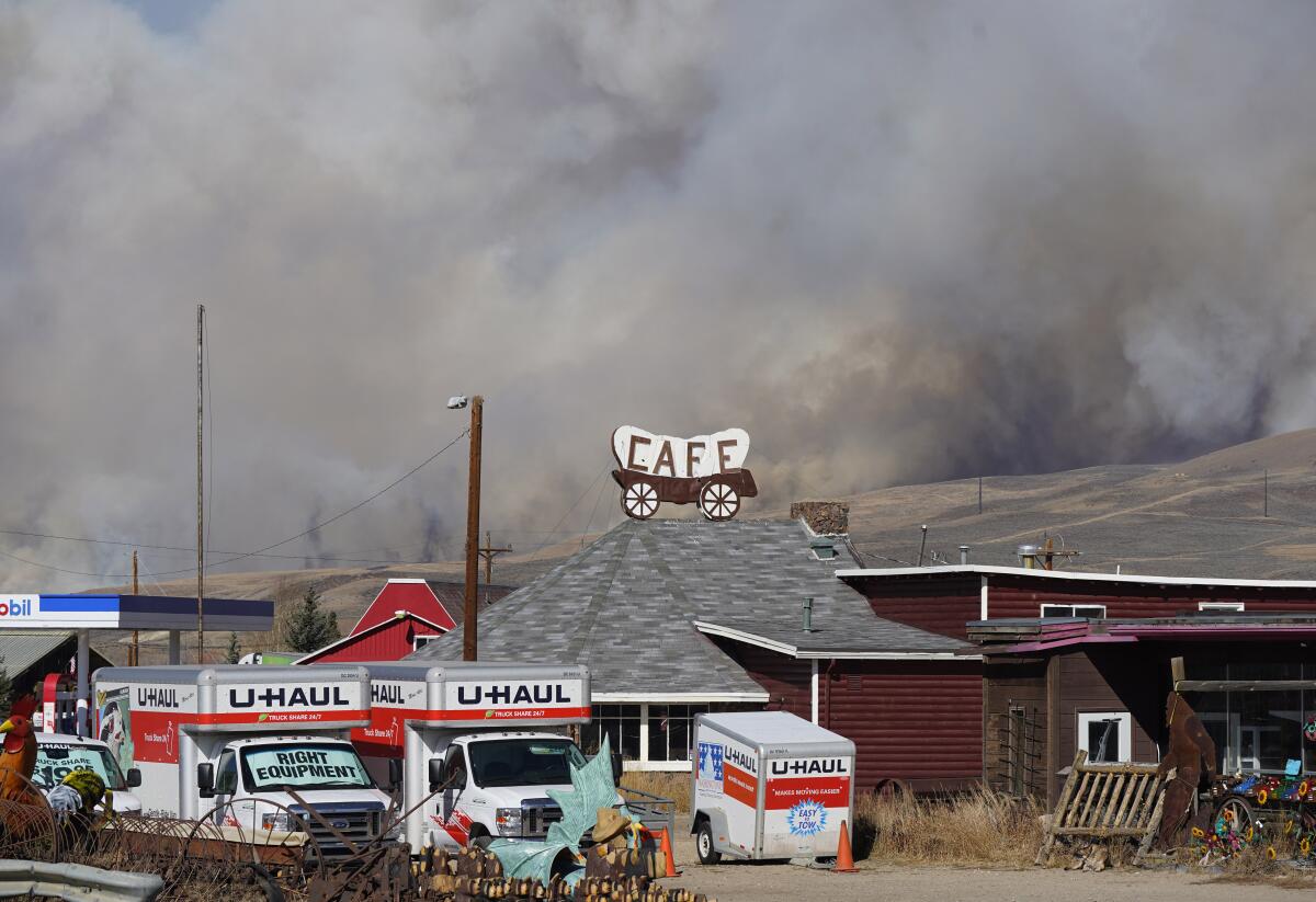 Smoke rises Thursday from a wildfire near Granby, Colo.