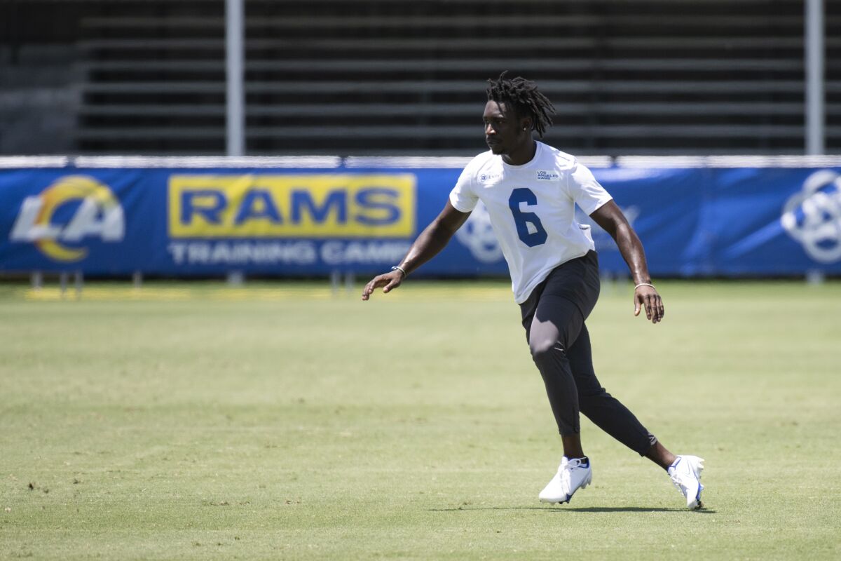 Rams cornerback Derion Kendrick runs during practice.
