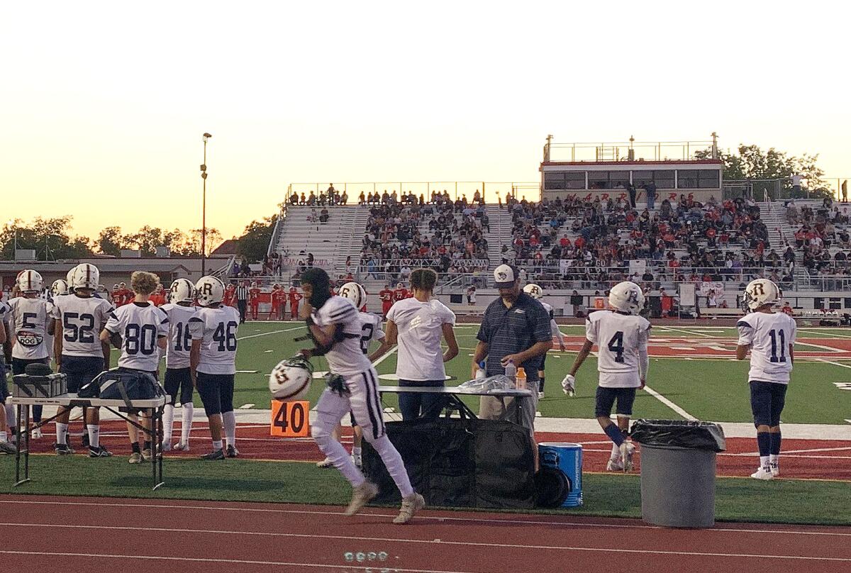 The Rosemont High football team takes the field against Galt High School 