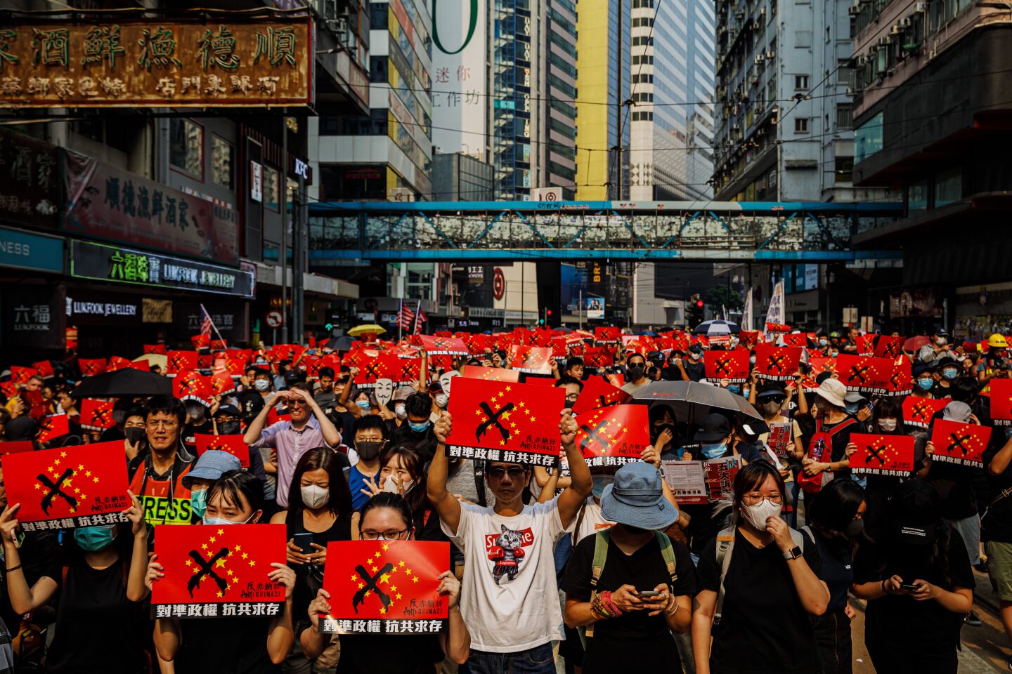 Hong Kong residents march in defiance of the upcoming China's national day, in Wan Chai area of Hong Kong, on Sept. 29, 2019.