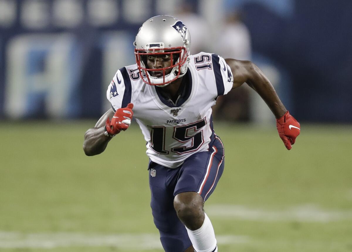 Dontrelle Inman runs a route during a New England Patriots preseason game against the Tennessee Titans on Aug. 17.