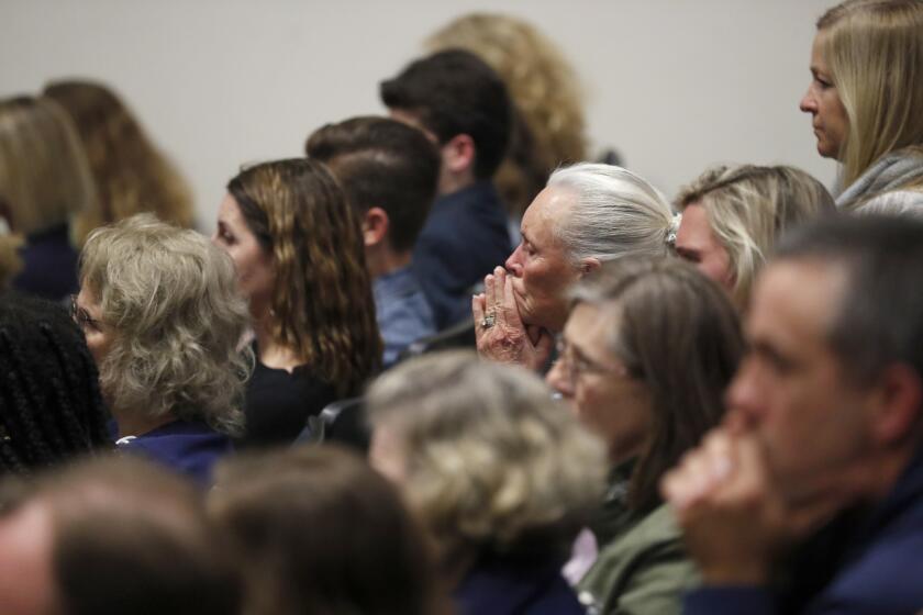 NEWPORT BEACH, CALIF. -- MONDAY, MARCH 4, 2019: Parents, students, community members attend packed Newport Harbor High School theater to discuss how to overcome anti-semitism after photos of students' Nazi salute and Solo cups arranged in a swastika went viral over the weekend in Newport Beach, Calif., on March 4, 2019. (Allen J. Schaben / Los Angeles Times)