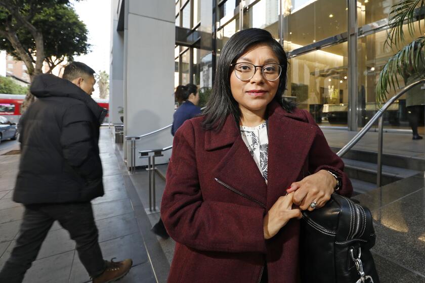 LOS ANGELES, CA - JANUARY 10, 2020 Attorney Lizbeth Mateo, who is an undocumented immigration attorney photographed on her way to Immigration Court in downtown Los Angeles Friday morning January 10, 2020 for a Steve Lopez column. (Al Seib / Los Angeles Times)