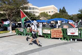 IRVINE, CA - APRIL 29, 2024: Pro-Palestinian protesters have formed an encampment in the central part of the UC Irvine campus on April 29, 2024 in Irvine, California.(Gina Ferazzi / Los Angeles Times)