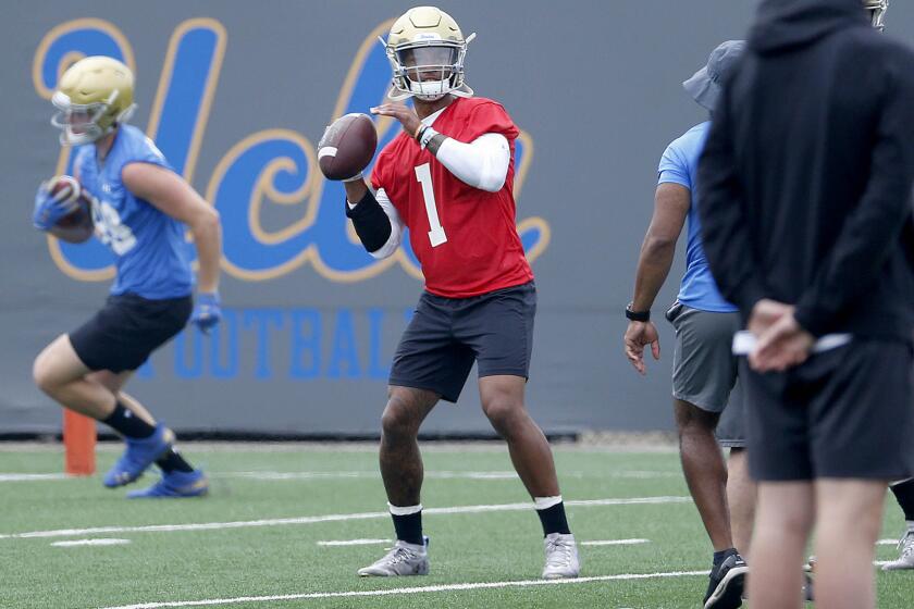 LOS ANGELES, CALIF. -- WEDNESDAY, JULY 31, 2019: Dorian Thompson-Robinson (1), quarterback, at fall football camp practice at the football fields at the Wasserman Football Center on the campus of UCLA in Los Angeles, Calif., on July 31, 2019. (Gary Coronado / Los Angeles Times)