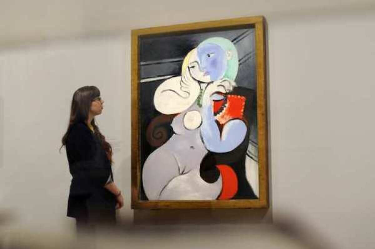 Pablo Picasso's "'Nude Woman in a Red Armchair." An airport in Edinburgh, Scotland, has reversed its decision to cover up a poster of the painting.