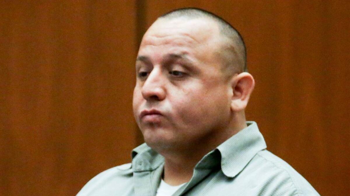 Former Monterey Park Police Officer Israel Sanchez, pictured at an earlier court hearing, was sentenced Tuesday to nearly eight years in prison for a conviction for sexually assaulting women during traffic stops.