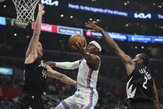 Oklahoma City Thunder guard Luguentz Dort, center, shoots as LA Clippers center Mason Plumlee, left, and forward Kawhi Leonard defend during the first half of an NBA basketball game Thursday, March 23, 2023, in Los Angeles. (AP Photo/Mark J. Terrill)