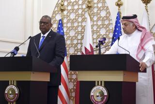 US Secretary of Defense Lloyd Austin speaks during a joint press conference with US Secretary of State Antony Blinken, Qatari Deputy Prime Minister and Foreign Minister Mohammed bin Abdulrahman al-Thani, and Qatari Defense Minister Khalid Bin Mohammed Al-Attiyah, right, at the Ministry of Foreign Affairs in Doha, Qatar, Tuesday, Sept. 7, 2021. (Olivier Douliery/Pool Photo via AP)