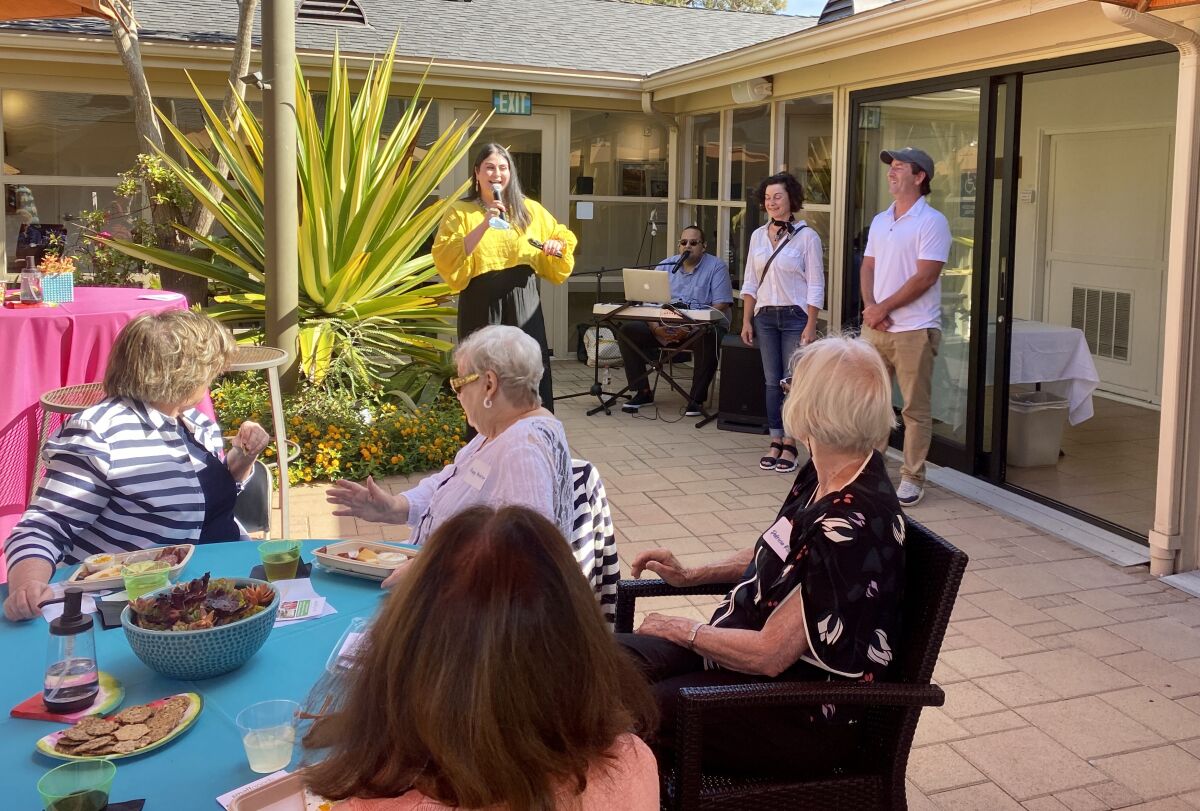 Executive Director Nancy Walters speaks at the La Jolla Community Center's "Summer Soiree."