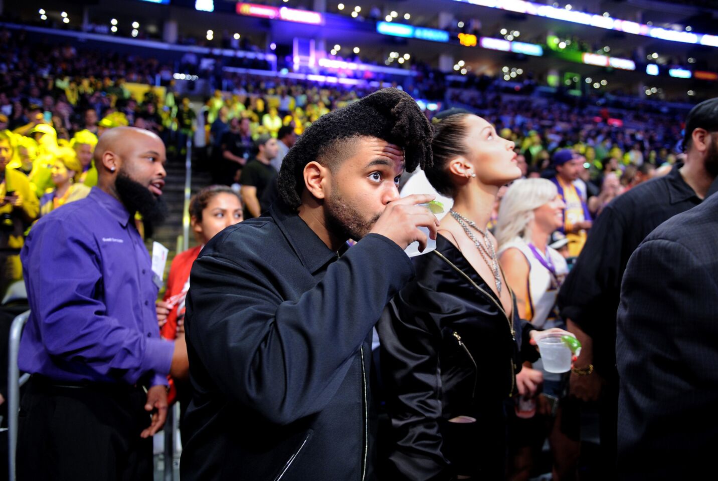 The Weeknd and girlfriend Bella Hadid arrive for Kobe Bryant's final game at Staples Center.