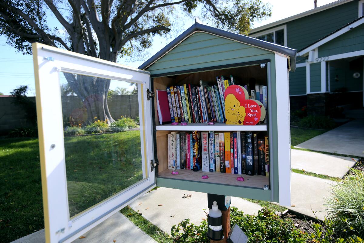 A Little Free Library on the 9200 block of Heatherton Circle in Huntington Beach lets people take and drop off books.