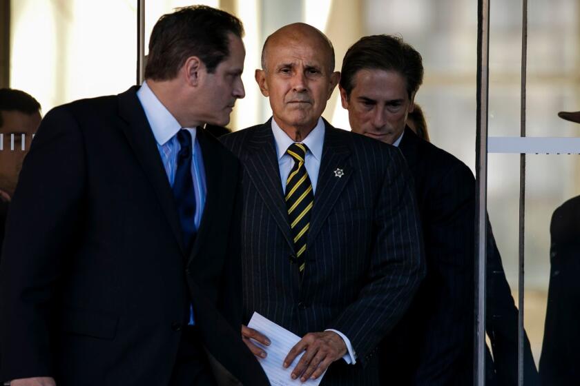 Former Los Angeles County Sheriff Lee Baca in December after jurors were unable to reach a verdict in his trial on charges he obstructed an FBI investigation into county jails.