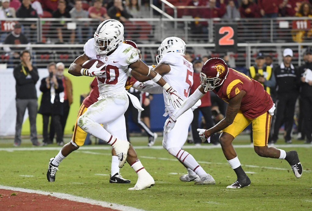 Stanford running back Bryce Love scores on a nine-yard touchdown run against USC before halftime of the Pac-12 championship game at Levi's Stadium.