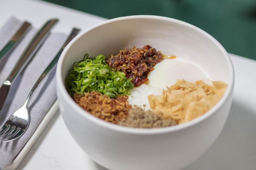 LOS ANGELES, CALIFORNIA - APR. 10, 2019: Koshihikari rice congee, xo, pork floss, and onsen egg from Nightshade, a new restaurant by chef owner Mei Lin, a 2014 Eater Young Gun and Top Chef season 12 winner, on Wednesday, Apr. 10, 2019, in Arts District, downtown Los Angeles. (Photo / Silvia Razgova)