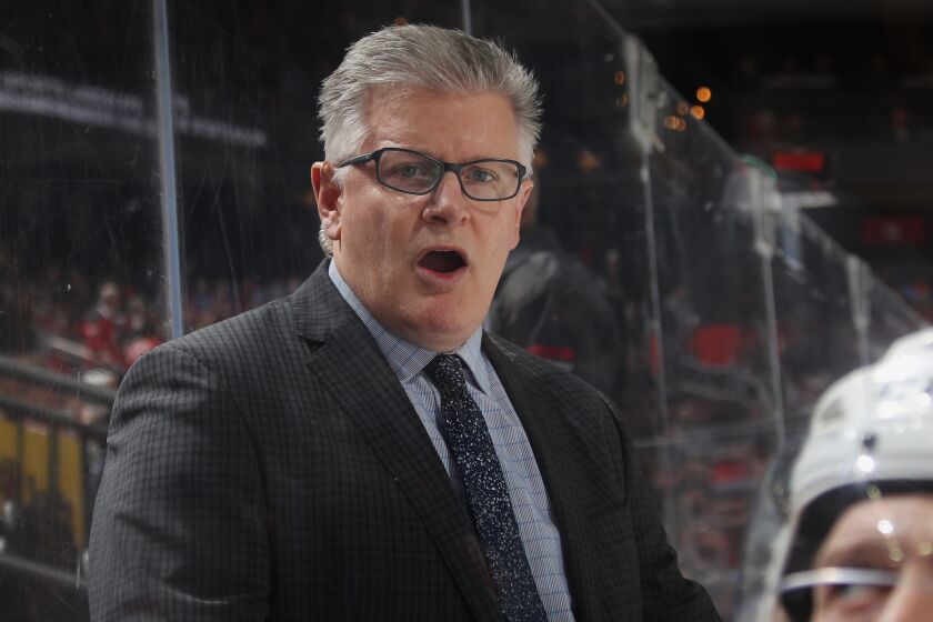 NEWARK, NEW JERSEY - FEBRUARY 21: Associate coach Marc Crawford of the Ottawa Senators handles bench duties during the second period against the New Jersey Devils at the Prudential Center on February 21, 2019 in Newark, New Jersey. (Photo by Bruce Bennett/Getty Images)