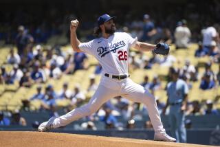 Los Angeles Dodgers starting pitcher Tony Gonsolin (26) delivers a pitch during the first inning of a baseball game against the Toronto Blue Jays in Los Angeles, Wednesday, July 26, 2023. (AP Photo/Kyusung Gong)