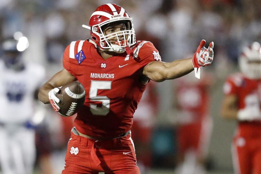 SANTA ANA, CALIF. - SEP. 21, 2018. Mater Dei receiver Bru McCoy signals a first down after making a catch against IMG in the first quarter Friday, Sept. 21, 2018, at Santa Ana Stadium. (Luis Sinco/Los Angeles Times)